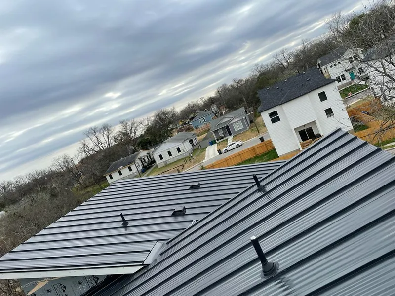 Standing seam metal roof panels with vents for Skylight Repair in Towson